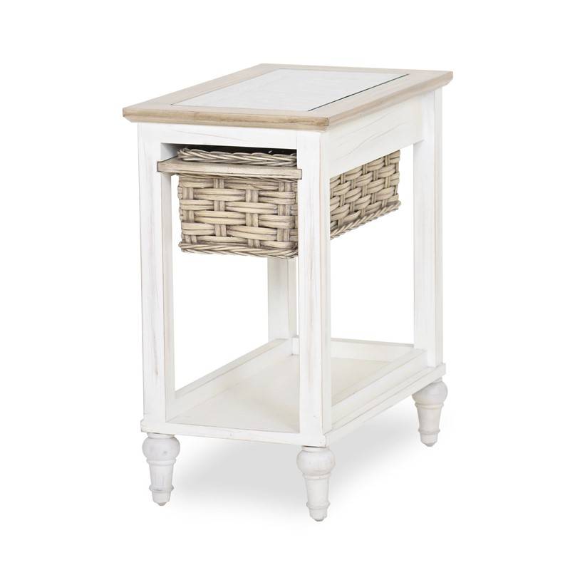 Island Breeze – Chairside Table This Island Breeze occasional collection features woven baskets, inset glass that sits above the woven top, and is complemented by a slightly distressed finish on the solid frames that gives these pieces a unique casual and tropical flair. Description Frame is made of kiln-dried solid wood products This item has an inset glass that sits above the woven top The basket runs on wood This chairside table is stocked and shown in Weathered Wood/White finish. It is also available in Gray/Distressed White finish – see it here Dimensions: 14″ W x 22″ D x 26″ H SKU: B59109-WD/WH