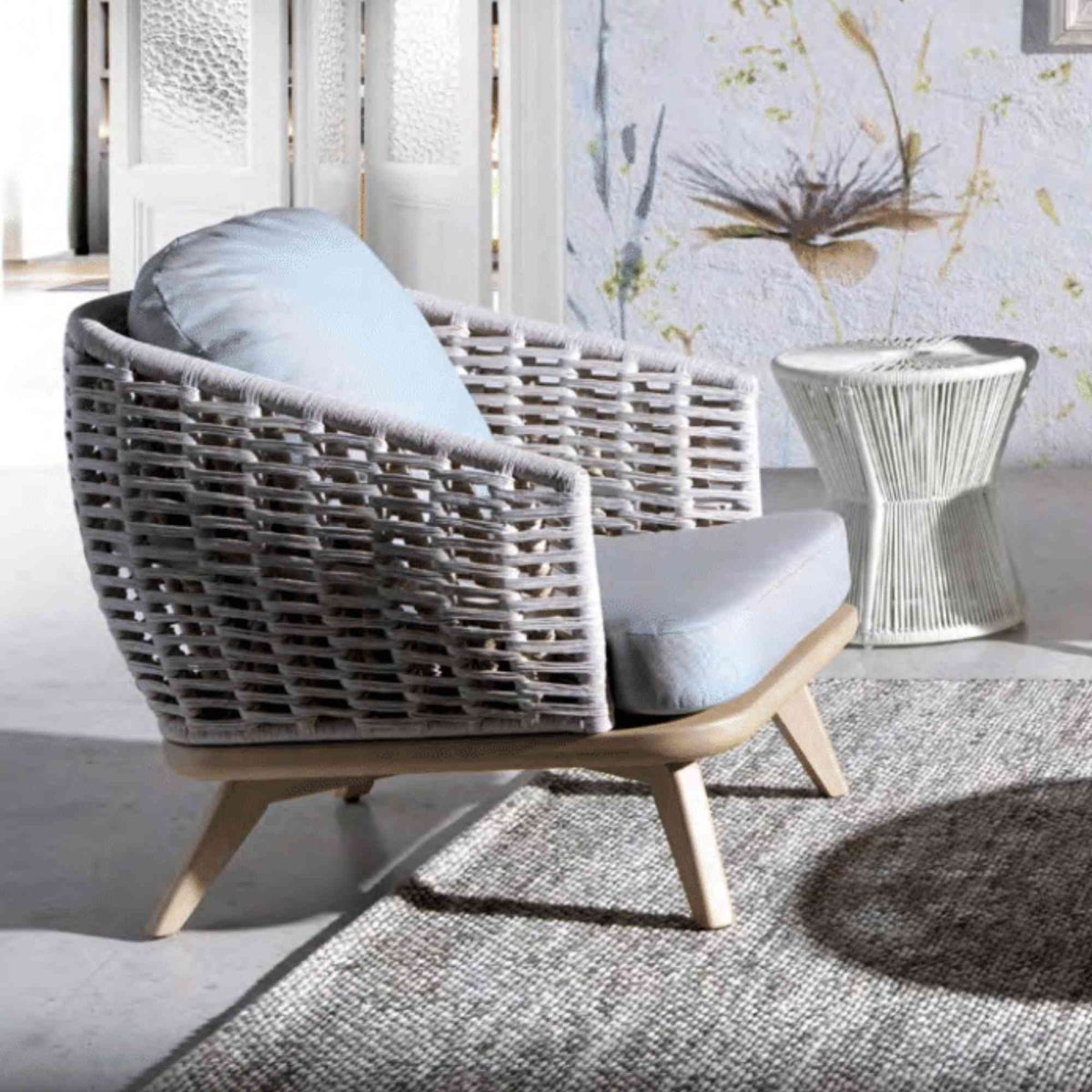 Panama Jack Tulum Armchair in natural seagrass with grey cushion