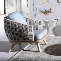 Panama Jack Tulum Armchair in natural seagrass with grey cushion